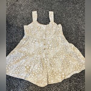 Romper size Medium from the boutique The Post - brand new without tags